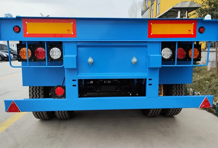 Tri Axle 40Ton Flatbed Trailer-flatbed trailer_skeletal trailer_low bed trailer_dump trailer_cargo trailer-Shandong Jiuzhou Automobile Manufacturing Co., Ltd.  Tri Axle 40Ton Flatbed Trailer-flatbed trailer_skeletal trailer_low bed trailer_dump trailer_cargo trailer-Shandong Jiuzhou Automobile Manufacturing Co., Ltd.
