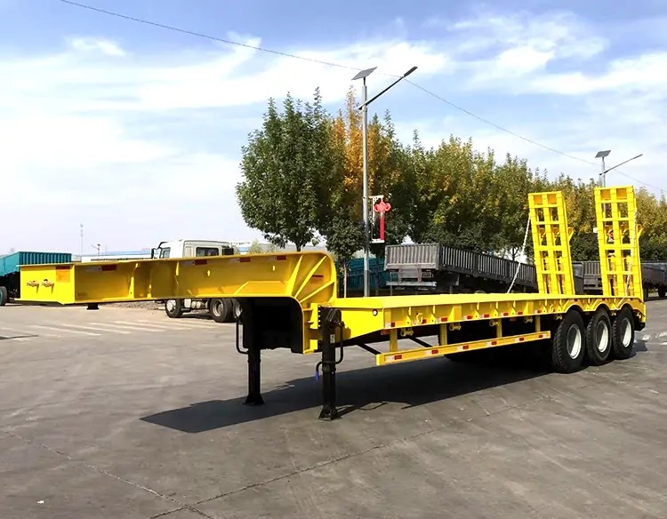 3-Axle 80-Ton Low-Bed Semi-Trailers Shipped to Nigeria, Tailored for Local Heavy-Duty Transport Needs-flatbed trailer_skeletal trailer_low bed trailer_dump trailer_cargo trailer-Shandong Jiuzhou Automobile Manufacturing Co., Ltd. 3-Axle 80-Ton Low-Bed Semi-Trailers Shipped to Nigeria, Tailored for Local Heavy-Duty Transport Needs-flatbed trailer_skeletal trailer_low bed trailer_dump trailer_cargo trailer-Shandong Jiuzhou Automobile Manufacturing Co., Ltd.
