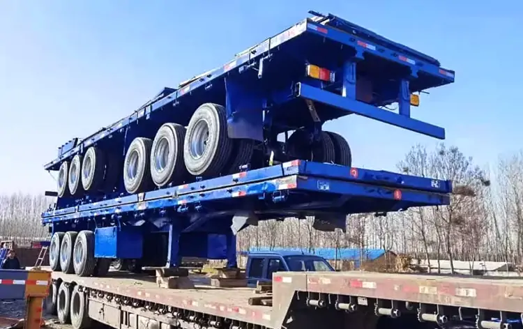 3 Axle Flatbed Semi-Trailer Shipped to Tanzania-flatbed trailer_skeletal trailer_low bed trailer_dump trailer_cargo trailer-Shandong Jiuzhou Automobile Manufacturing Co., Ltd. 3 Axle Flatbed Semi-Trailer Shipped to Tanzania-flatbed trailer_skeletal trailer_low bed trailer_dump trailer_cargo trailer-Shandong Jiuzhou Automobile Manufacturing Co., Ltd.
