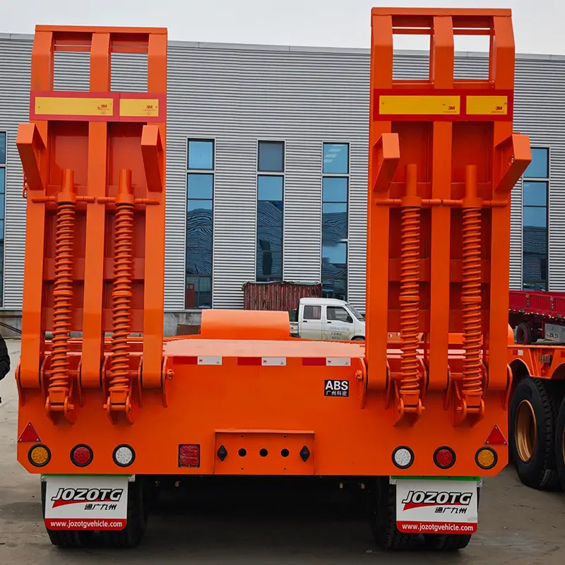 3 Axle 80Ton Lowbed Semi Trailer for Construction Machinery-flatbed trailer_skeletal trailer_low bed trailer_dump trailer_cargo trailer-Shandong Jiuzhou Automobile Manufacturing Co., Ltd. 3 Axle 80Ton Lowbed Semi Trailer for Construction Machinery-flatbed trailer_skeletal trailer_low bed trailer_dump trailer_cargo trailer-Shandong Jiuzhou Automobile Manufacturing Co., Ltd.