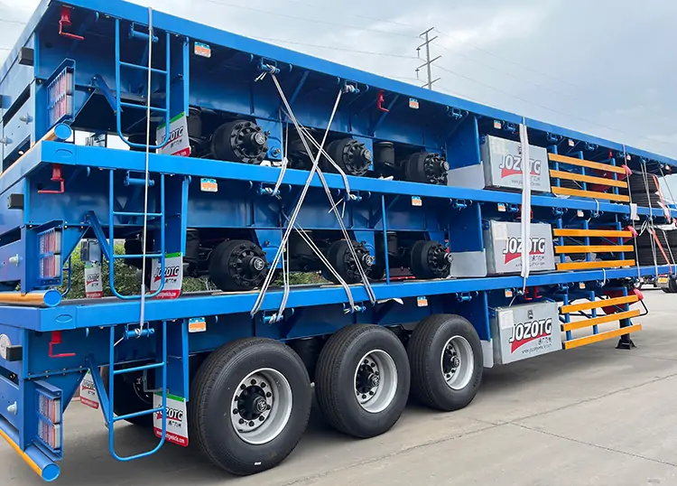 Single vs Dual Tyres on Flatbed Trailers-flatbed trailer_skeletal trailer_low bed trailer_dump trailer_cargo trailer-Shandong Jiuzhou Automobile Manufacturing Co., Ltd. Single vs Dual Tyres on Flatbed Trailers-flatbed trailer_skeletal trailer_low bed trailer_dump trailer_cargo trailer-Shandong Jiuzhou Automobile Manufacturing Co., Ltd.