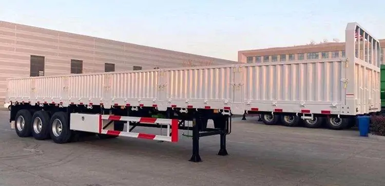 Tri Axle 12m Sidewall Trailer-flatbed trailer_skeletal trailer_low bed trailer_dump trailer_cargo trailer-Shandong Jiuzhou Automobile Manufacturing Co., Ltd.