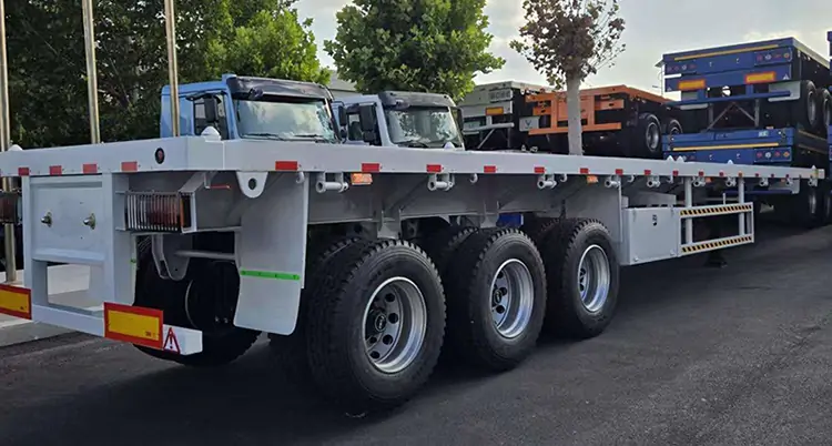 40 Feet 3 Axle Flatbed Semi Trailer-flatbed trailer_skeletal trailer_low bed trailer_dump trailer_cargo trailer-Shandong Jiuzhou Automobile Manufacturing Co., Ltd. 40 Feet 3 Axle Flatbed Semi Trailer-flatbed trailer_skeletal trailer_low bed trailer_dump trailer_cargo trailer-Shandong Jiuzhou Automobile Manufacturing Co., Ltd.