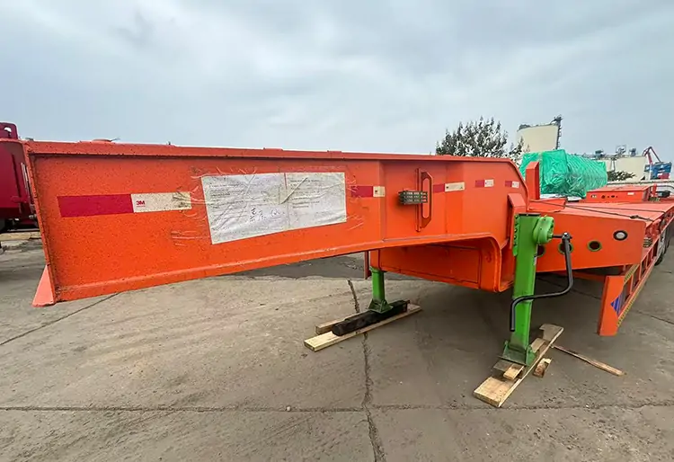 JOZOTG Low-Bed Semi-Trailers Successfully Shipped to Senegal, Empowering Local Infrastructure Development-flatbed trailer_skeletal trailer_low bed trailer_dump trailer_cargo trailer-Shandong Jiuzhou Automobile Manufacturing Co., Ltd.