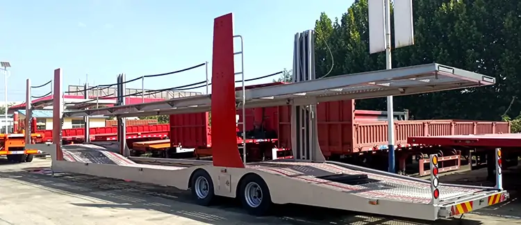 Application of Car Carrier Semi-trailers in the Automotive Industry-flatbed trailer_skeletal trailer_low bed trailer_dump trailer_cargo trailer-Shandong Jiuzhou Automobile Manufacturing Co., Ltd. Application of Car Carrier Semi-trailers in the Automotive Industry-flatbed trailer_skeletal trailer_low bed trailer_dump trailer_cargo trailer-Shandong Jiuzhou Automobile Manufacturing Co., Ltd.