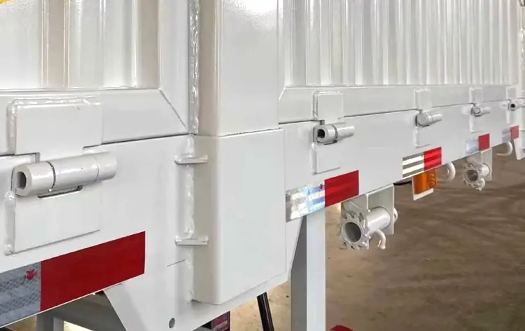 3-4 Axle Steel Fence Drop Side Semi-Trailer-flatbed trailer_skeletal trailer_low bed trailer_dump trailer_cargo trailer-Shandong Jiuzhou Automobile Manufacturing Co., Ltd.