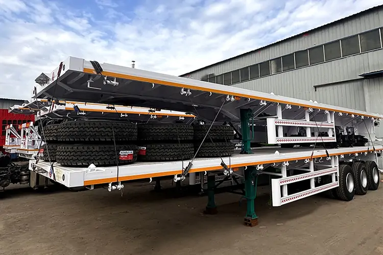  3 Axles Heavy Duty Steel Flatbed Semi Trailer-flatbed trailer_skeletal trailer_low bed trailer_dump trailer_cargo trailer-Shandong Jiuzhou Automobile Manufacturing Co., Ltd.