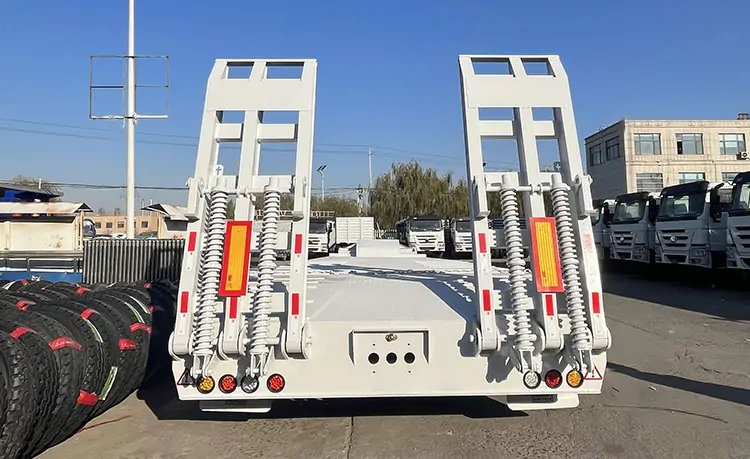 3 Axles 60ton Modular Low Bed Semi Trailer-flatbed trailer_skeletal trailer_low bed trailer_dump trailer_cargo trailer-Shandong Jiuzhou Automobile Manufacturing Co., Ltd. 3 Axles 60ton Modular Low Bed Semi Trailer-flatbed trailer_skeletal trailer_low bed trailer_dump trailer_cargo trailer-Shandong Jiuzhou Automobile Manufacturing Co., Ltd.