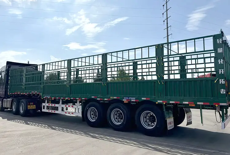 3 Axles 60 Ton Stake Fence Semi-trailer-flatbed trailer_skeletal trailer_low bed trailer_dump trailer_cargo trailer-Shandong Jiuzhou Automobile Manufacturing Co., Ltd. 3 Axles 60 Ton Stake Fence Semi-trailer-flatbed trailer_skeletal trailer_low bed trailer_dump trailer_cargo trailer-Shandong Jiuzhou Automobile Manufacturing Co., Ltd.