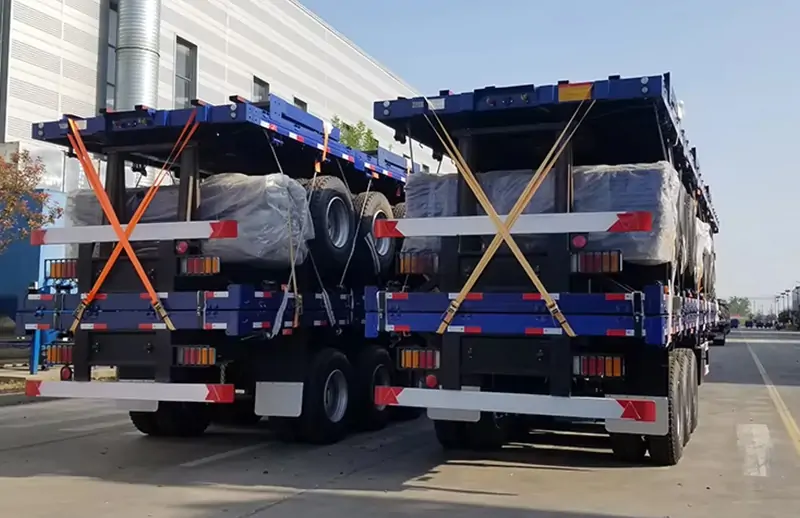 Batch 3‑Axle Flatbed Semi‑Trailers Shipped to Saudi Arabia for Bulk Cargo Transport-semi trailer-Shandong Jiuzhou Automobile Manufacturing Co., Ltd.