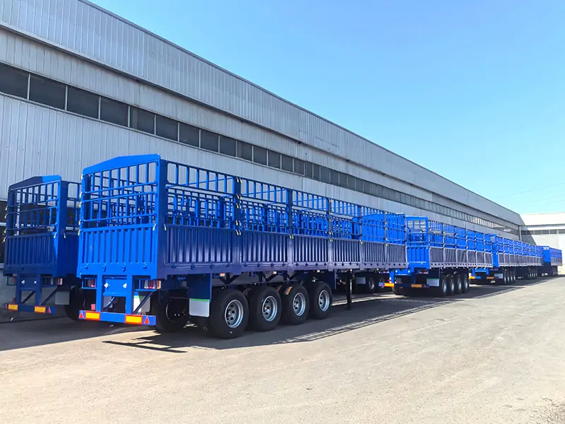 Shipment of Stake Semi‑Trailers to Guinea for Bulk Cargo Transport-semi trailer-Shandong Jiuzhou Automobile Manufacturing Co., Ltd. Shipment of Stake Semi‑Trailers to Guinea for Bulk Cargo Transport-semi trailer-Shandong Jiuzhou Automobile Manufacturing Co., Ltd.